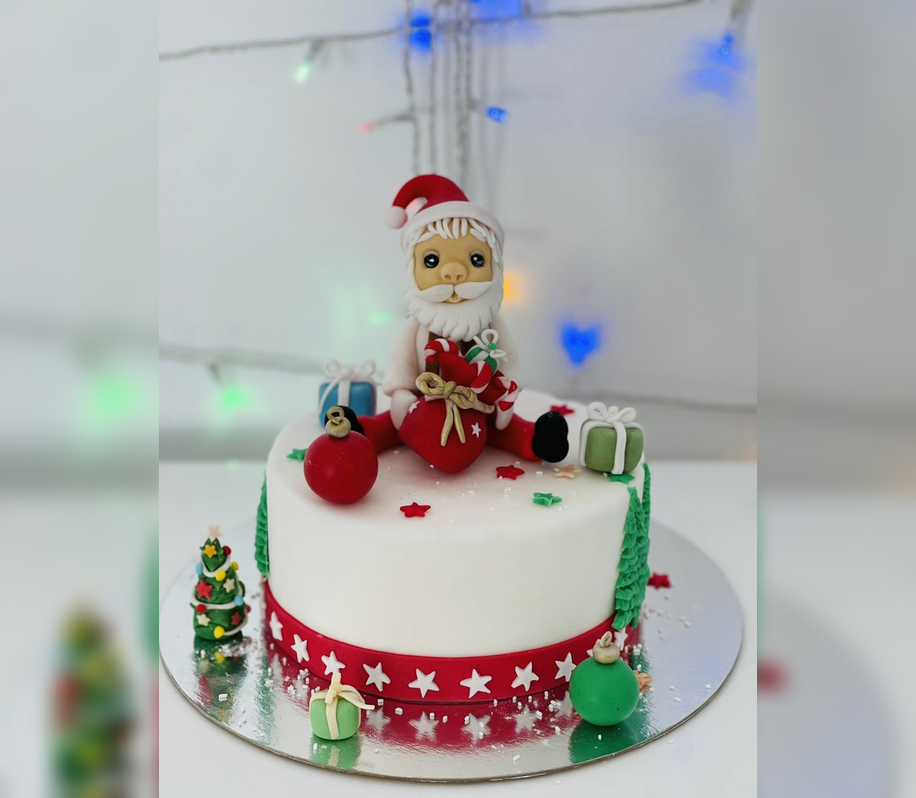Figurina pentru tort in forma de mos Craciun