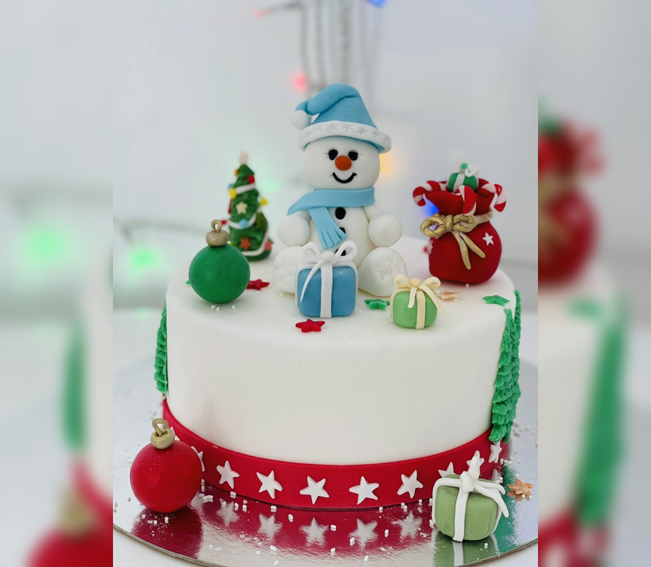 Figurina pentru tort in forma de om de zapada